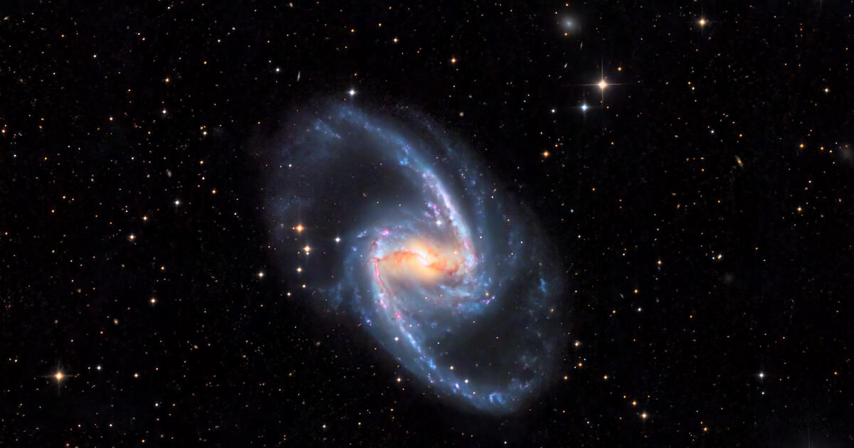 NGC 1365 The Great Barred Spiral Galaxy | Telescope Live