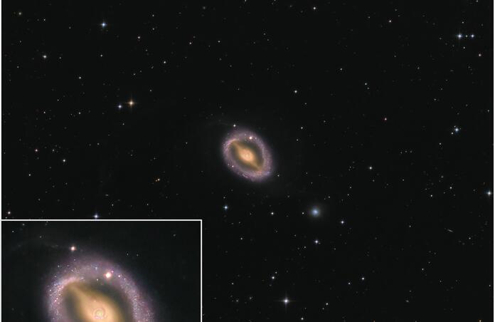 NGC 1512: a barred spiral galaxy with a double ring structure