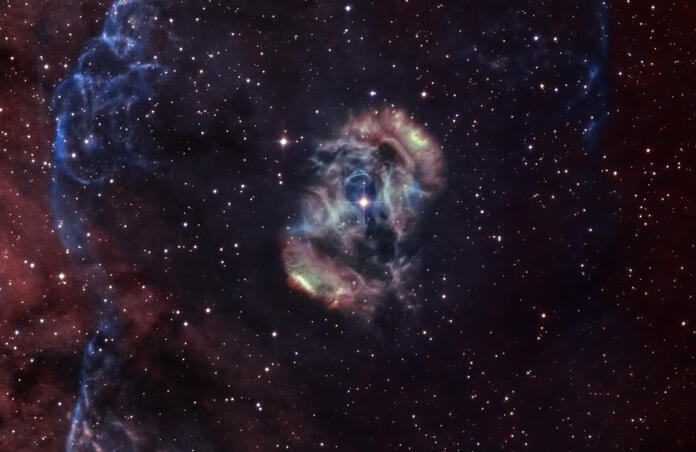 NGC 6165 Planetary nebula in Ara.