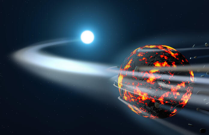 Artists impression of an asteroid being torn apart as it approaches a white dwarf