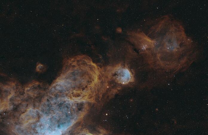 NGC 3324 (middle) and NGC 3293 (right)