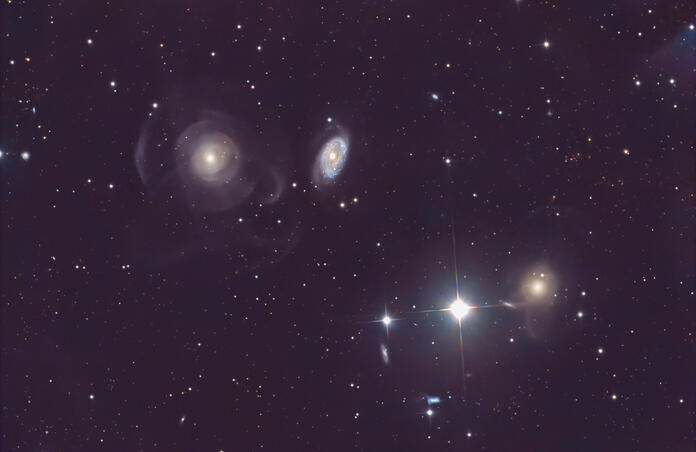 The Dynamic Dance of NGC 474 and its Galactic Neighbors