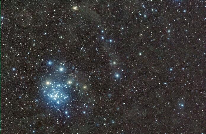 A Diamond (NGC 2516) set among the dust of the Constellation of Carina