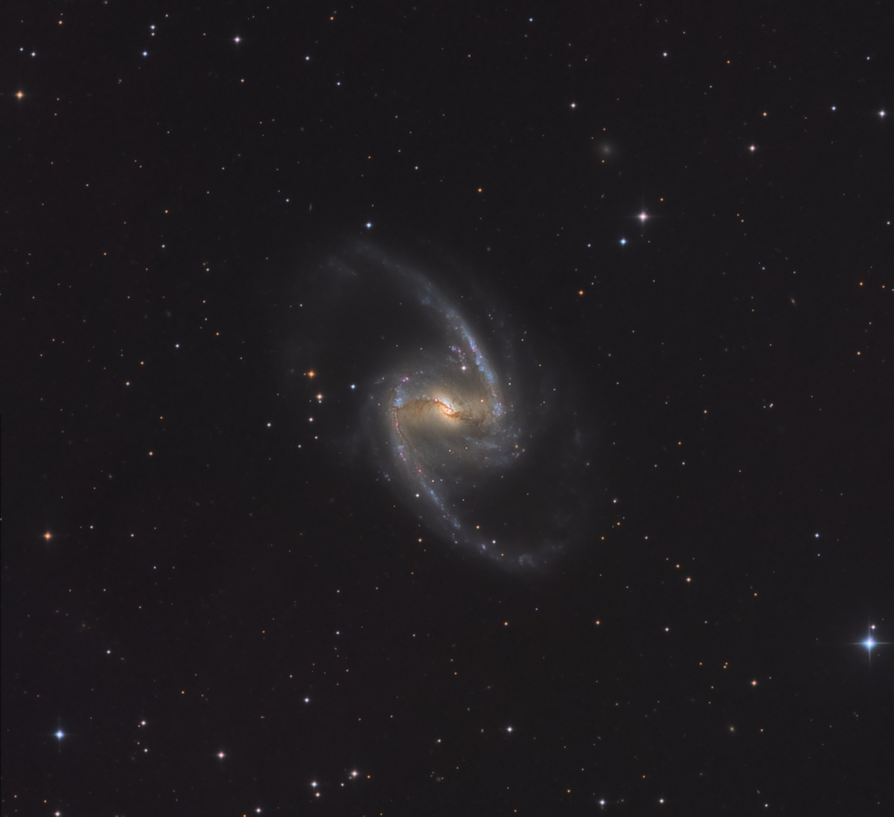NGC 1365 - THE GREAT BARRED SPIRAL GALAXY