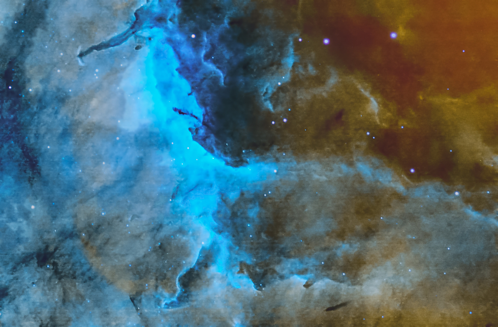 PILLARS AND DUST IN THE PELICAN NEBULA