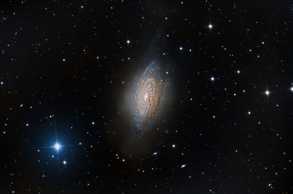 NGC3521 Spiral Galaxy and bright blue star HD96363.