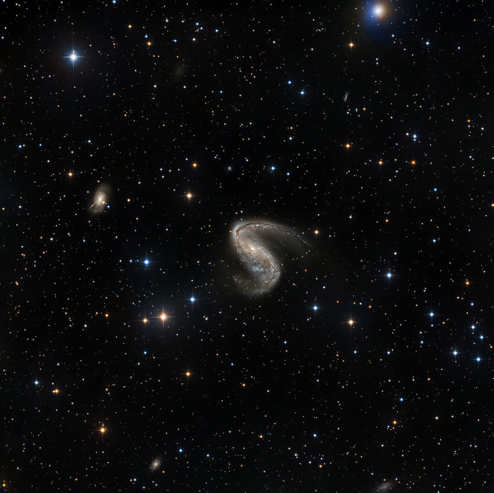 NGC2442/2443 Galaxy Floating in a beautiful star field.