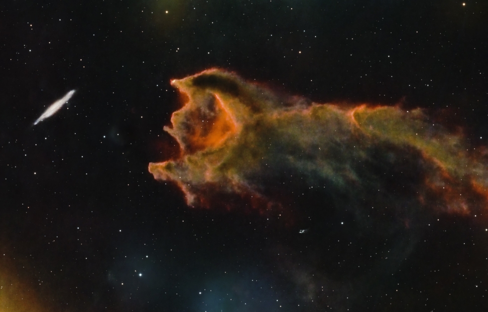 Cometary globule CG4 with galaxy ESO 257-19