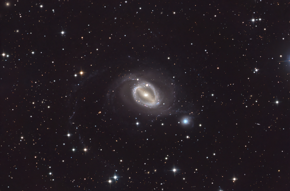 NGC 1512 - A Cosmic Dance in Horologium