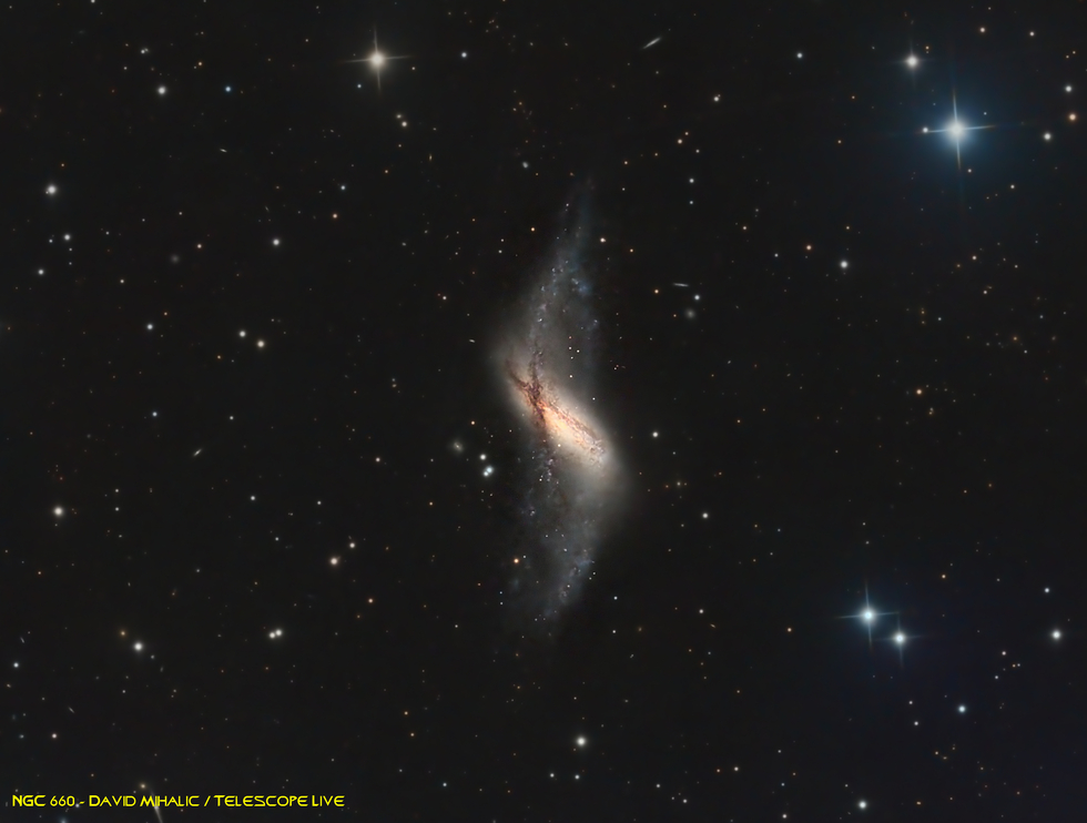 Updated: NGC 660 - polar-ring galaxy located approximately 45 million light-years from Earth in the Pisces